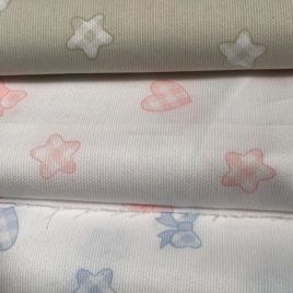 Tessuto con Fiocchi,Cuori e Stelle